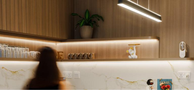 Modern kitchen with sleek cabinetry and lighting