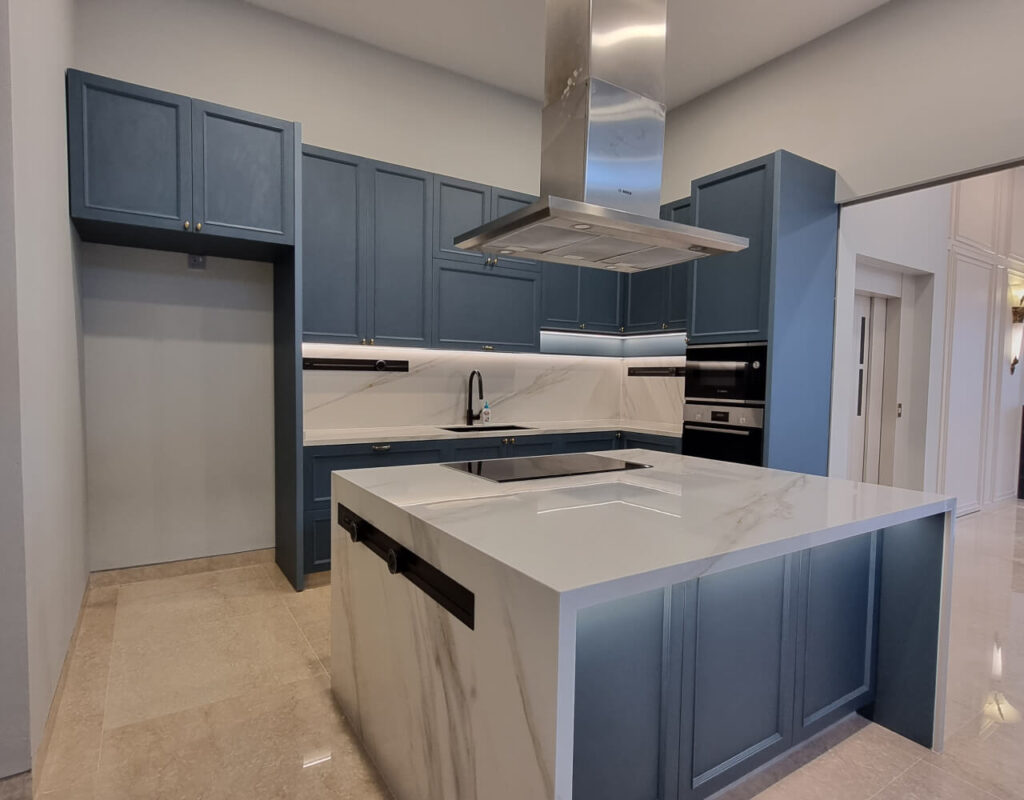 Large kitchen island in a landed property designed by Homescape