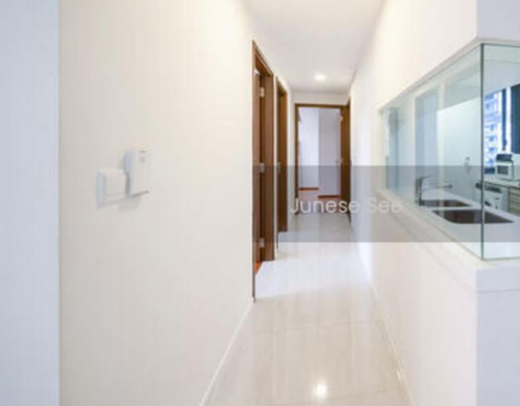 The default galley kitchen was separated by the living area by a wall with a glass window. But its enclosed walls restricted movement for our clients.